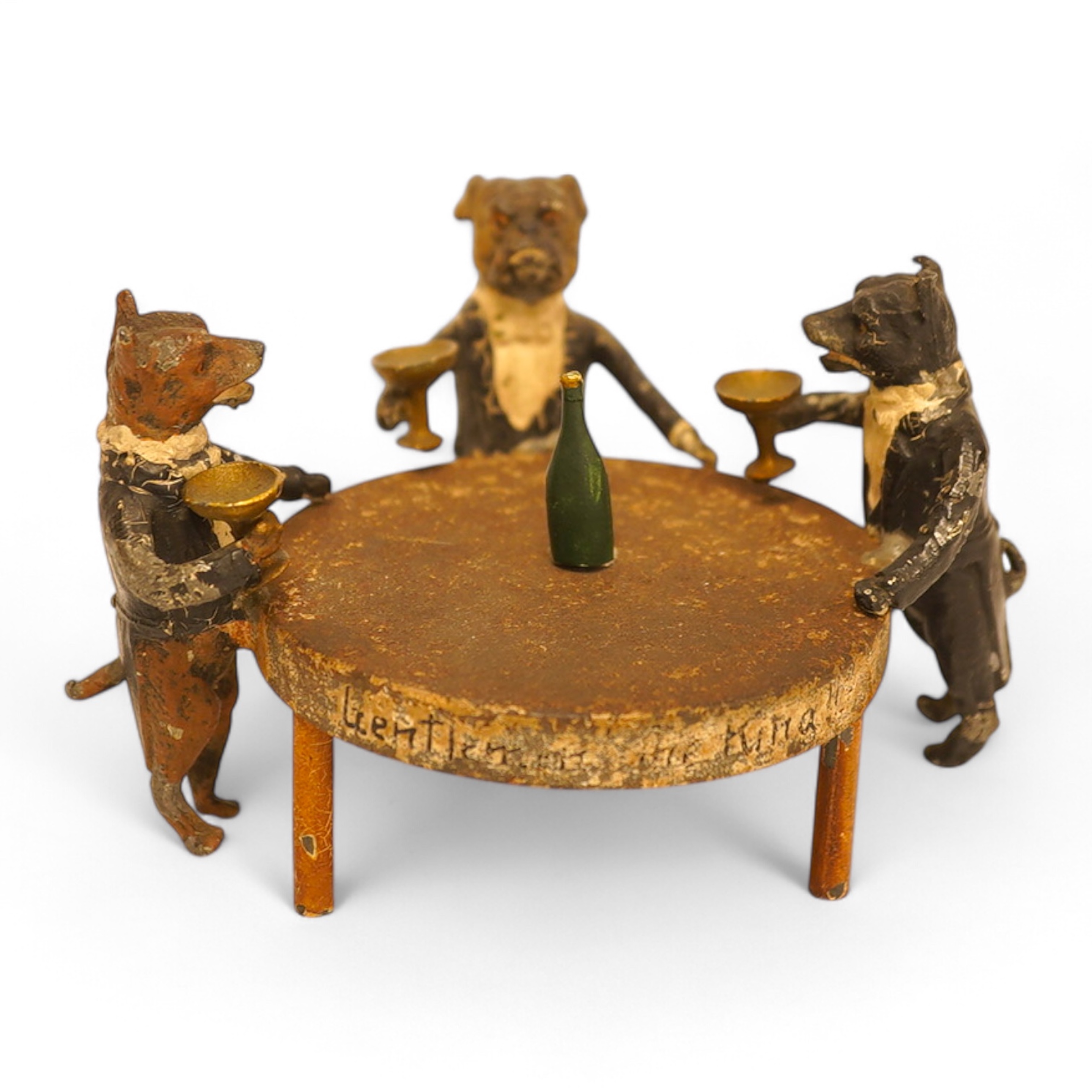 A cold painted spelter miniature ‘dog’ group, 6.5cm